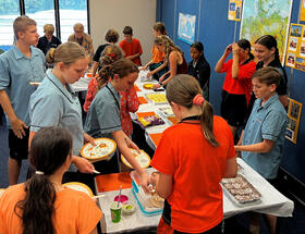 Students sharing food.