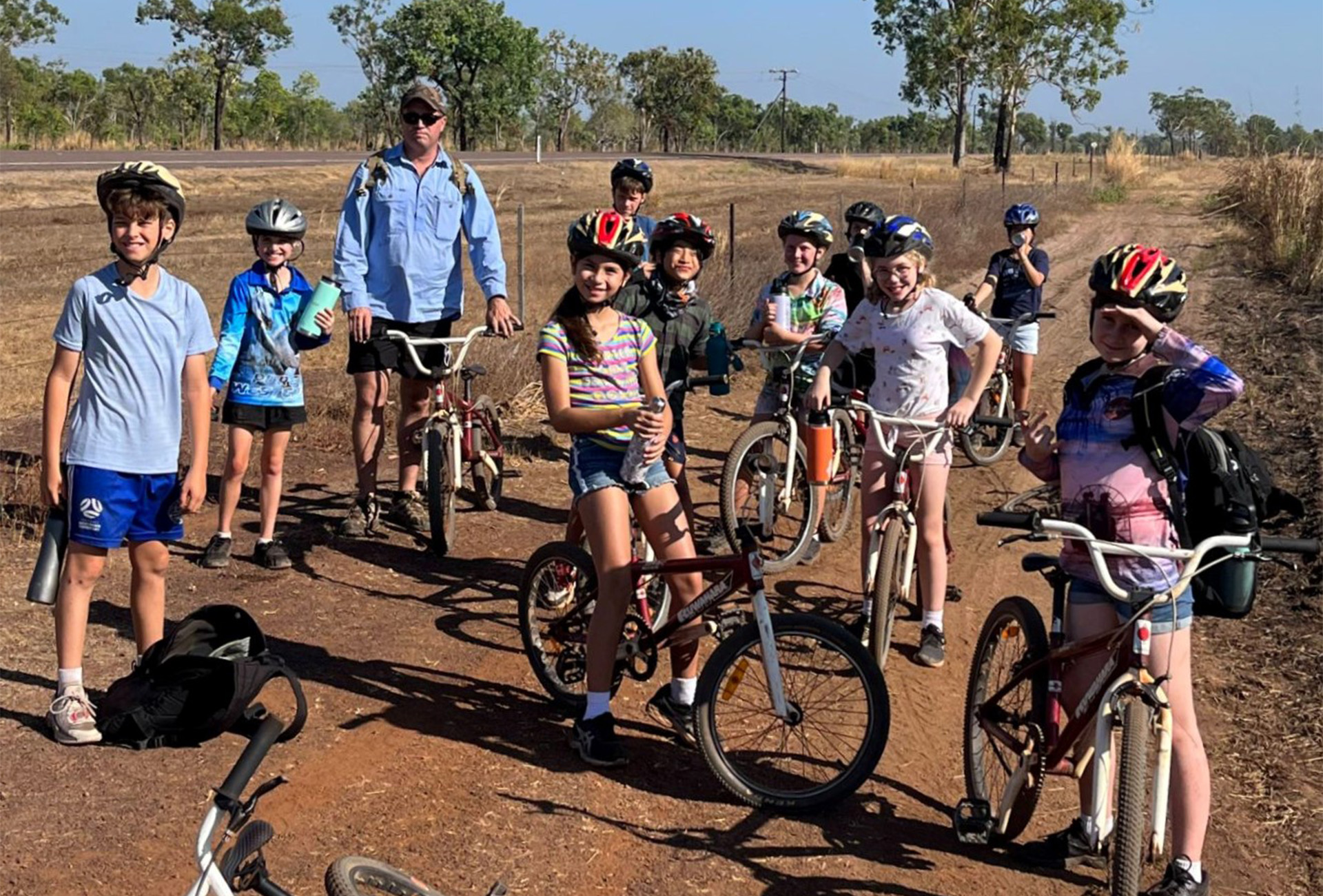 Students riding bikes at camp.