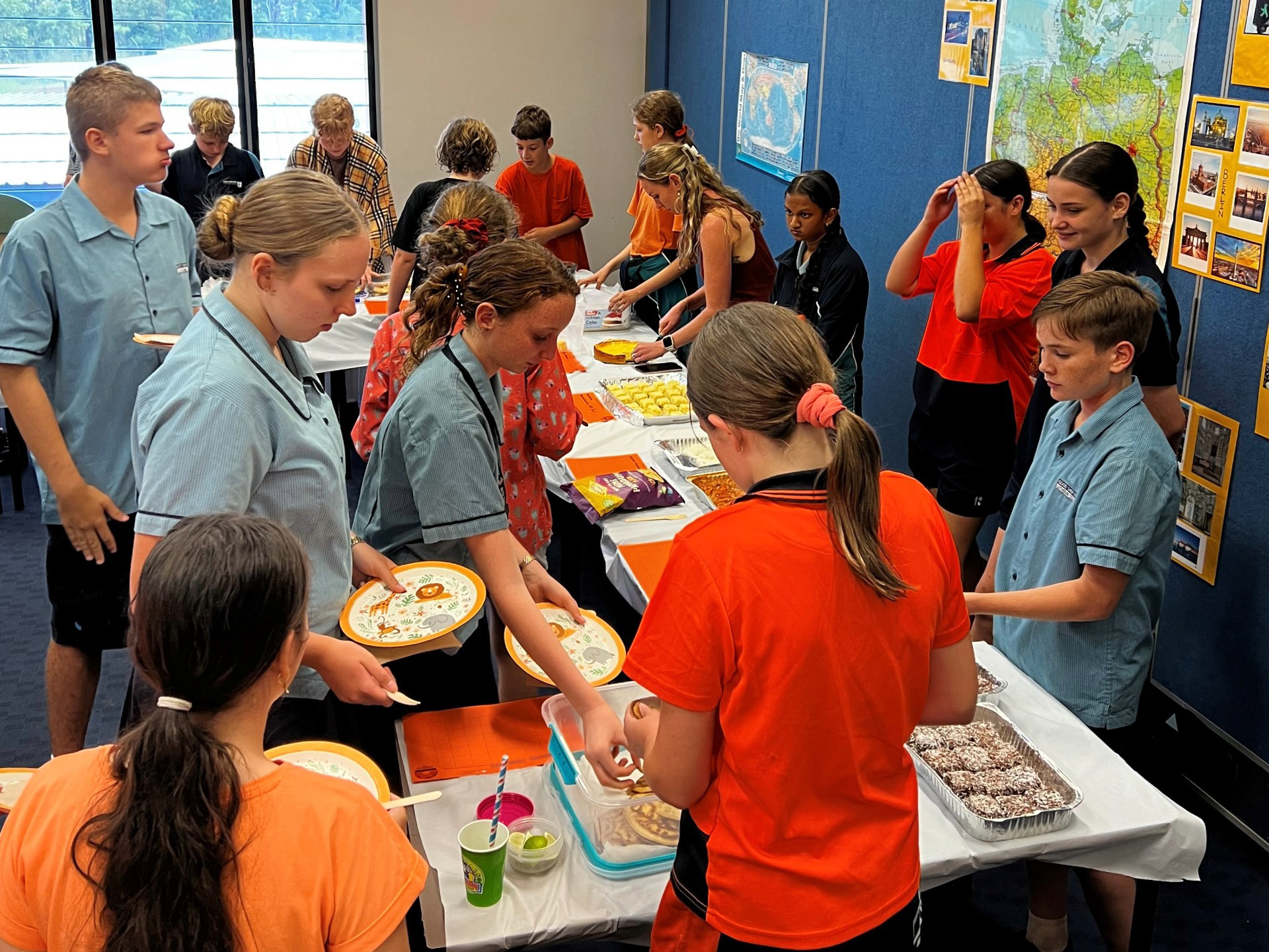 Students sharing food.