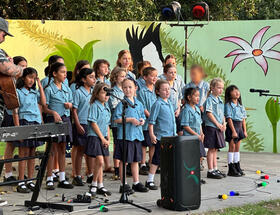 Junior School Choir singing at the markets.